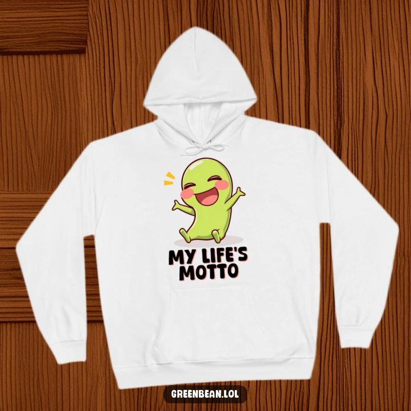 Funny hoodie showcasing a green bean character caught in a hilarious, comedic slip, perfect for cozy laughs and playful moments.