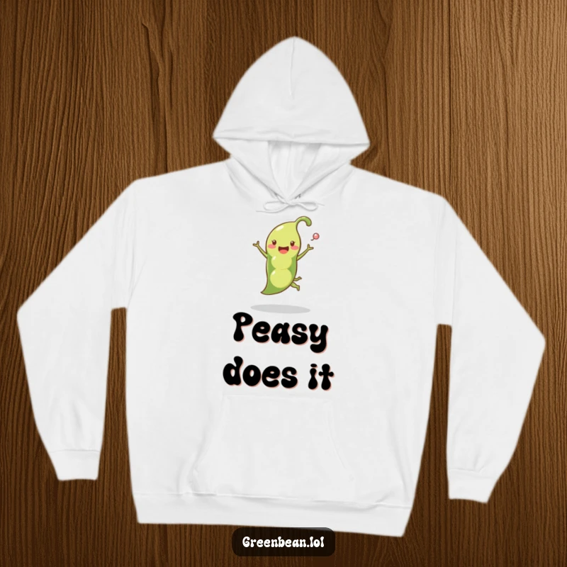 Funny pea pod hoodie showing a happy pea pod in a playful leap with peas popping out, conveying energetic vegetable humor.