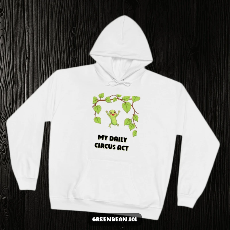 Funny hoodie featuring a happy string bean swinging joyfully on a vine, capturing a moment of playful freedom.