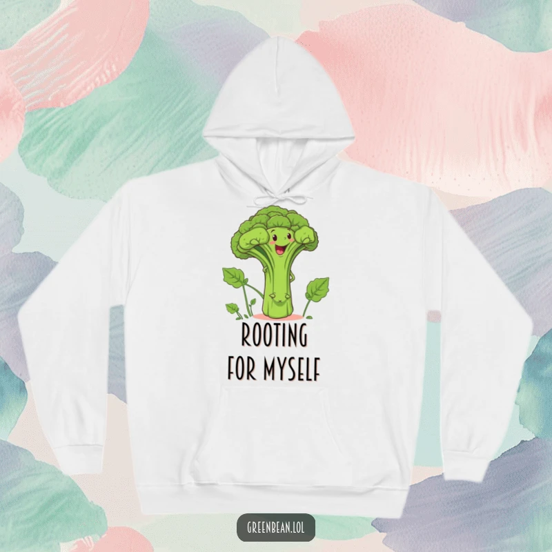 Funny hoodie showing a determined green bean character climbing a giant, smiling broccoli stalk, illustrating a funny challenge.